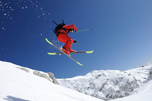 Extreme free ride skier in mid air